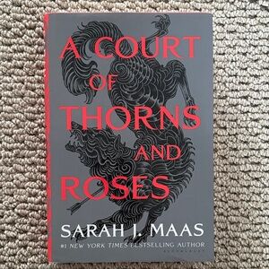 A Court of Thorns and Roses by Sarah J. Maas - hardcover